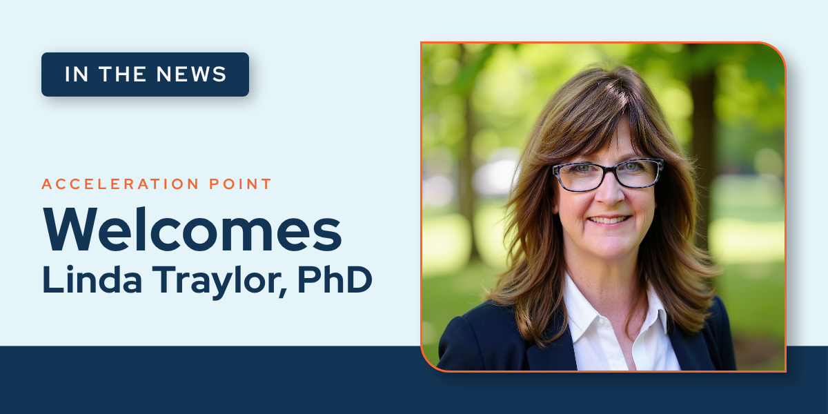 Branded announcement graphic featuring a headshot of Linda Traylor, PhD, with the text "Acceleration Point Welcomes Linda Traylor, PhD" on a navy and orange background, announcing her appointment as VP of Medical Excellence.