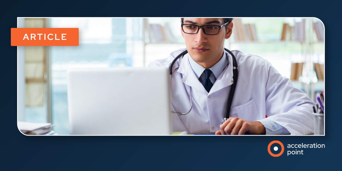 A physician works at a laptop in a medical library, representing how digital opinion leaders now share scientific expertise through online channels.