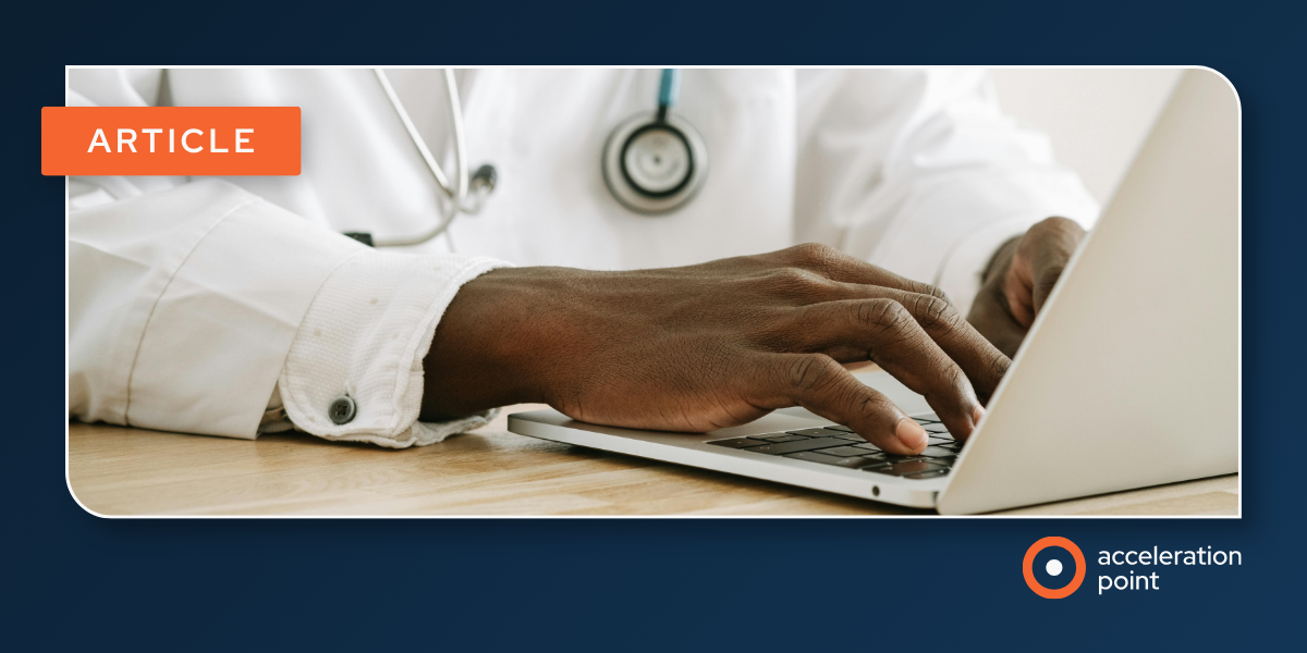A physician in a white coat types on a laptop, illustrating how digital opinion leaders share medical education through social media.