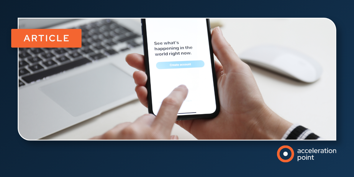 Hands hold a smartphone on X's account sign-up screen beside a laptop, representing how professionals engage with X for KOL/DOL medical affairs conversations.