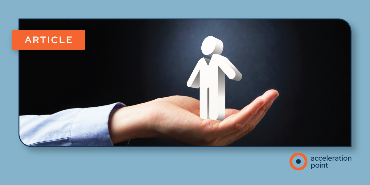 A hand holds a single spotlit paper figure, representing how Medical Affairs teams identify key opinion leaders and digital opinion leaders.